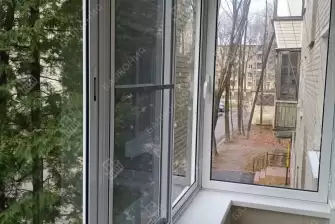 Отделка балкона под ключ с холодным остеклением и выносом остекления