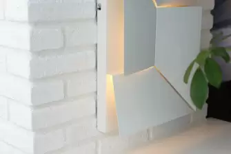 Отделка П-образного балкона искусственным камнем с утеплением