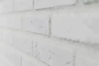 Отделка П-образного балкона искусственным камнем с утеплением