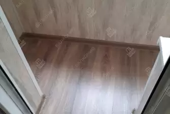 Холодное остекление и отделка П-образного балкона