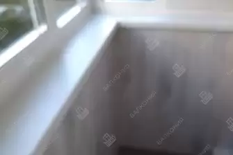 Отделка и остекление Г-образного балкона